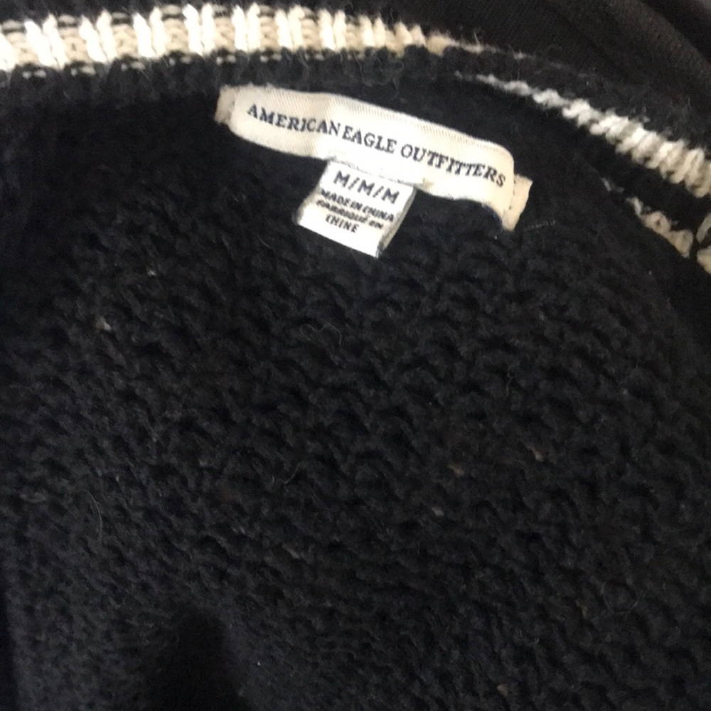 I’m selling a brand new worn once black and white American eagle cardigan